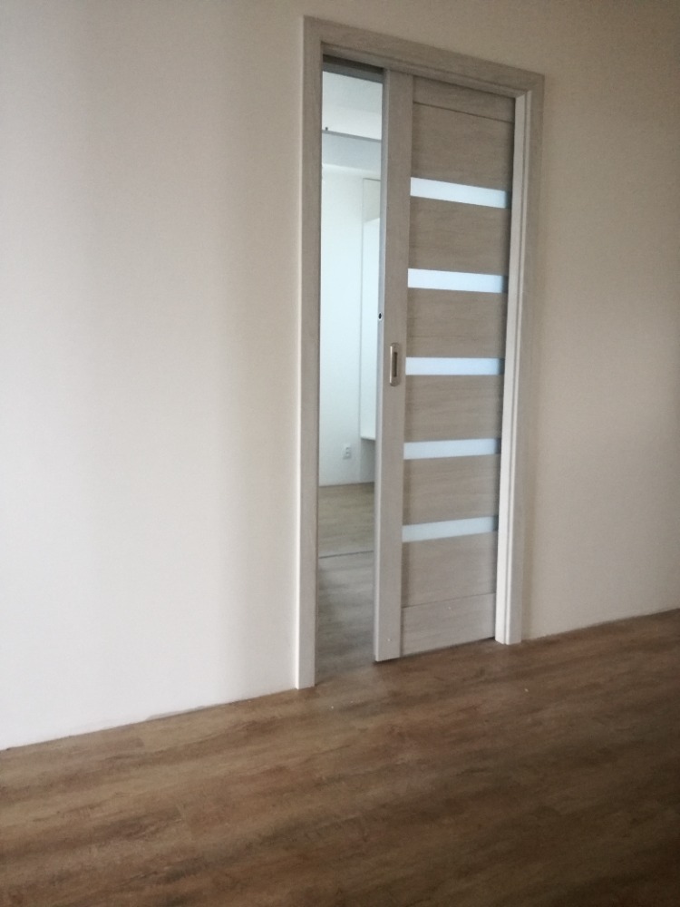 Novostavba s rámovými dveřmi TOSA v dekoru dub bělený